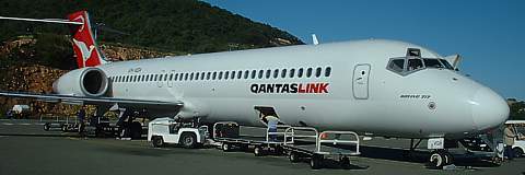 Qantaslink Boeing 717 at Hamilton Island May 2003. The Qantas staff created a stink when I took this photo and wanted me to hand over my camera. Weird!